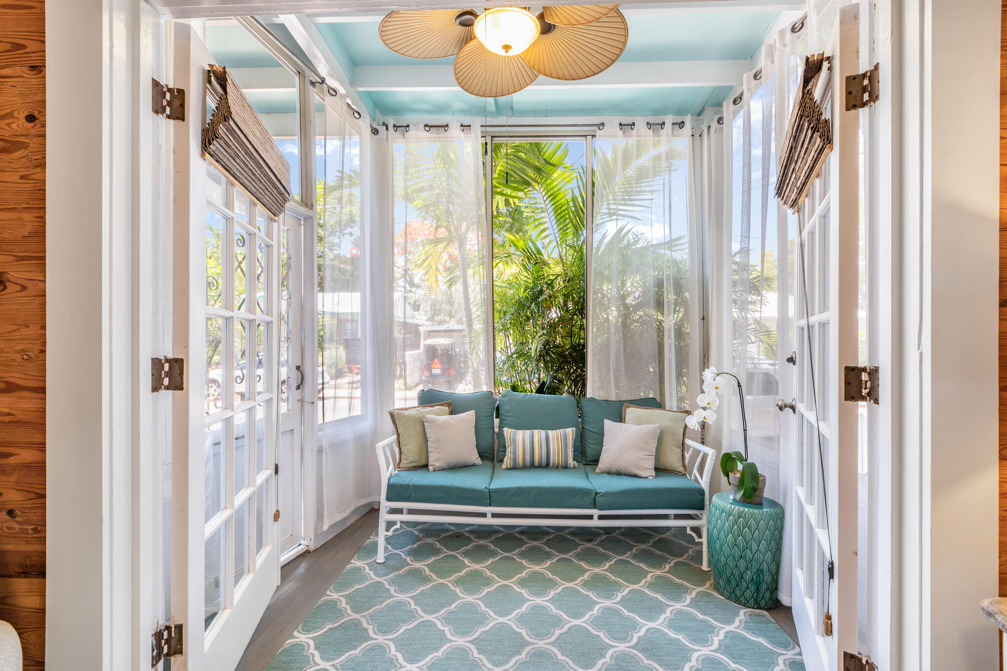 1203 Newton Street, Unit 1 Key West, FL 33040 - Photo 10 of 25 a living room with furniture and a large window