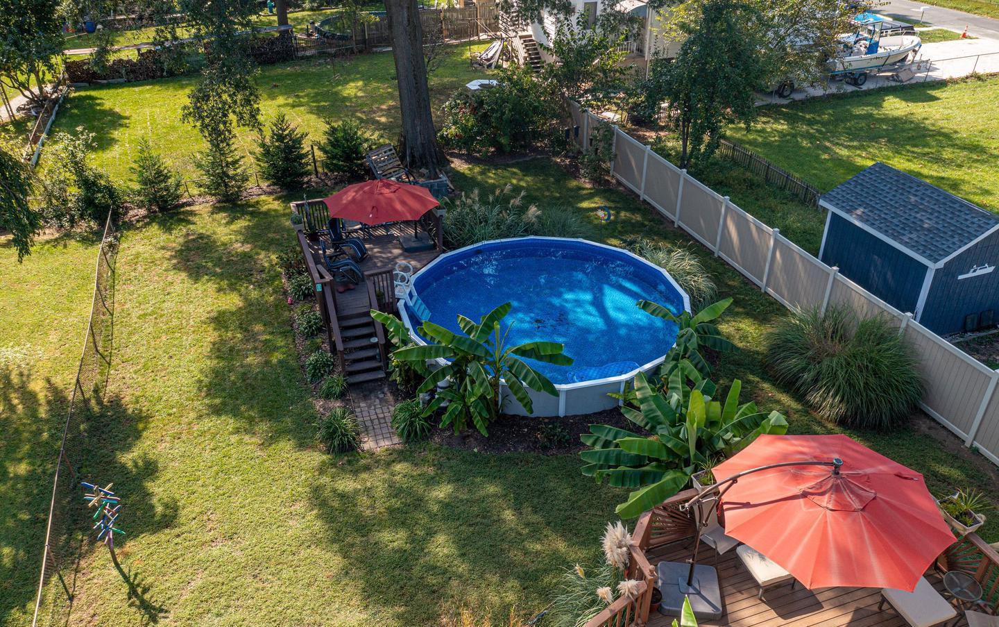 2203 Middleborough Road Essex, MD 21221 - Photo 11 of 35 Pic from last summer w/pool open & plants in bloom