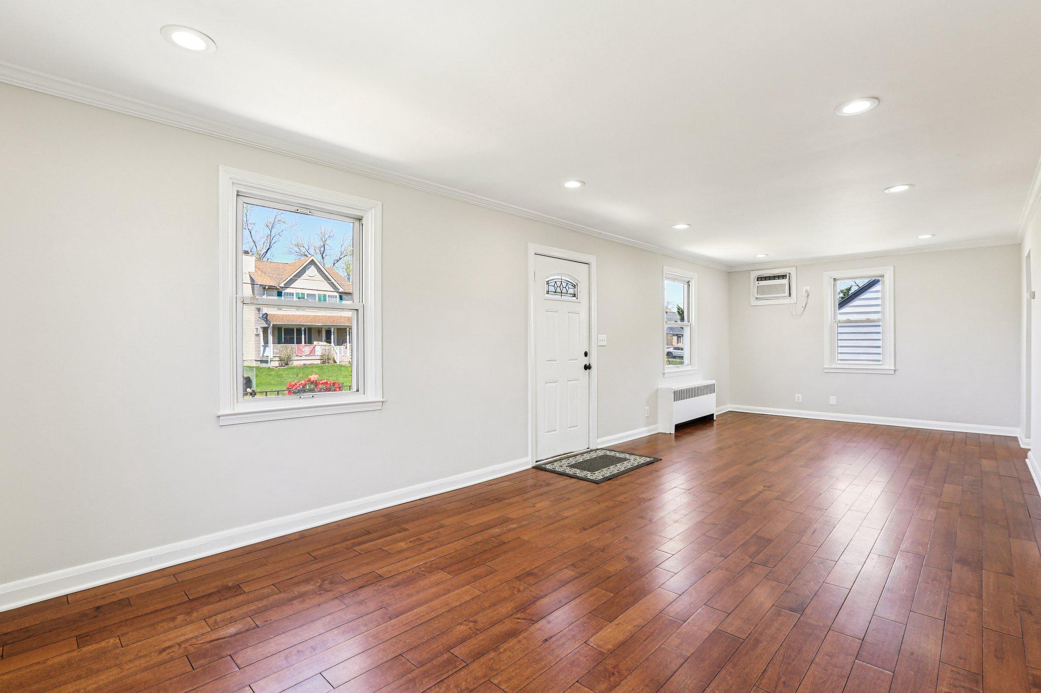 2203 Middleborough Road Essex, MD 21221 - Photo 16 of 35 Spacious, sunlit open-concept living/dining area.