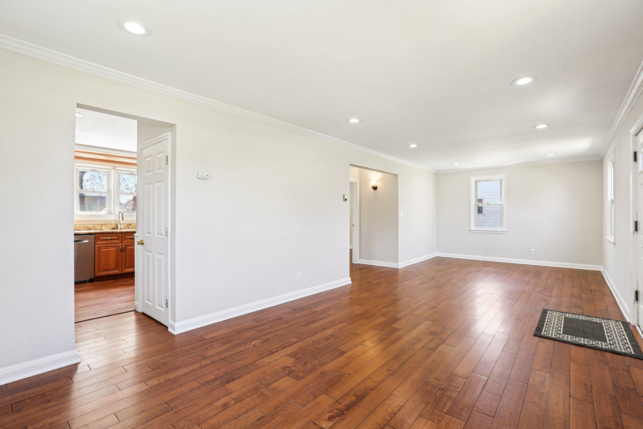 2203 Middleborough Road Essex, MD 21221 - Photo 17 of 35 Spacious, sunlit open-concept living/dining area.