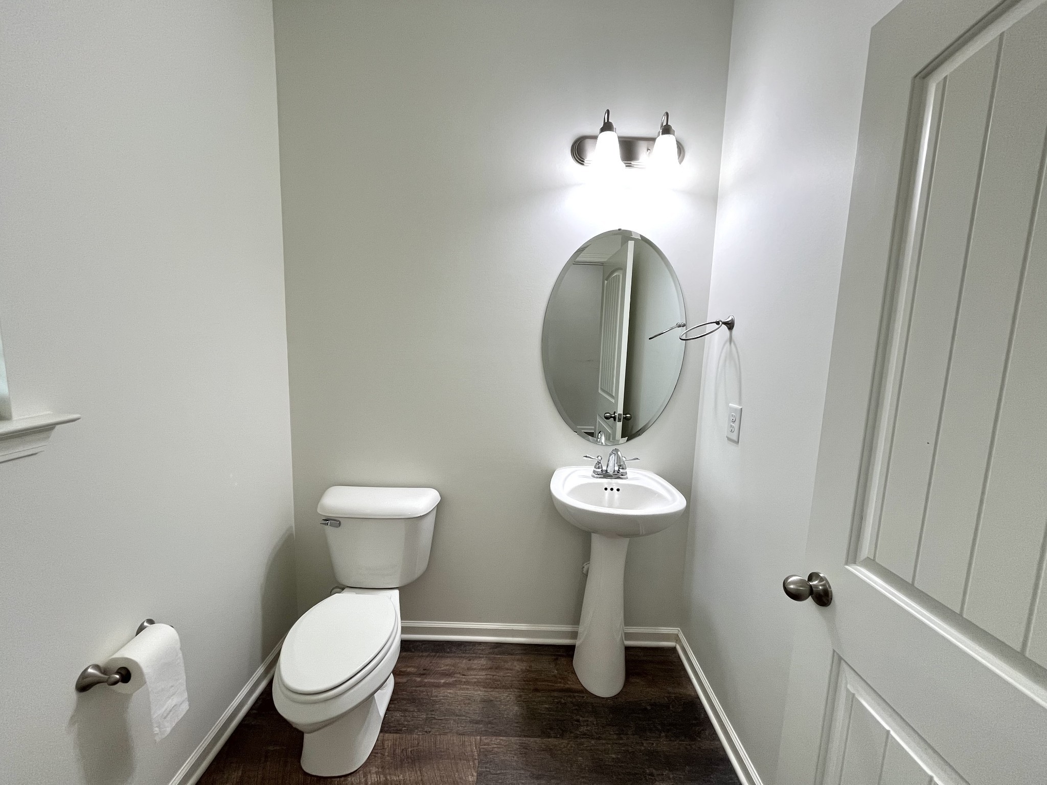 105 East Coker Way Spring Hill, TN 37174 - Photo 3 of 23 a bathroom with a toilet sink and mirror
