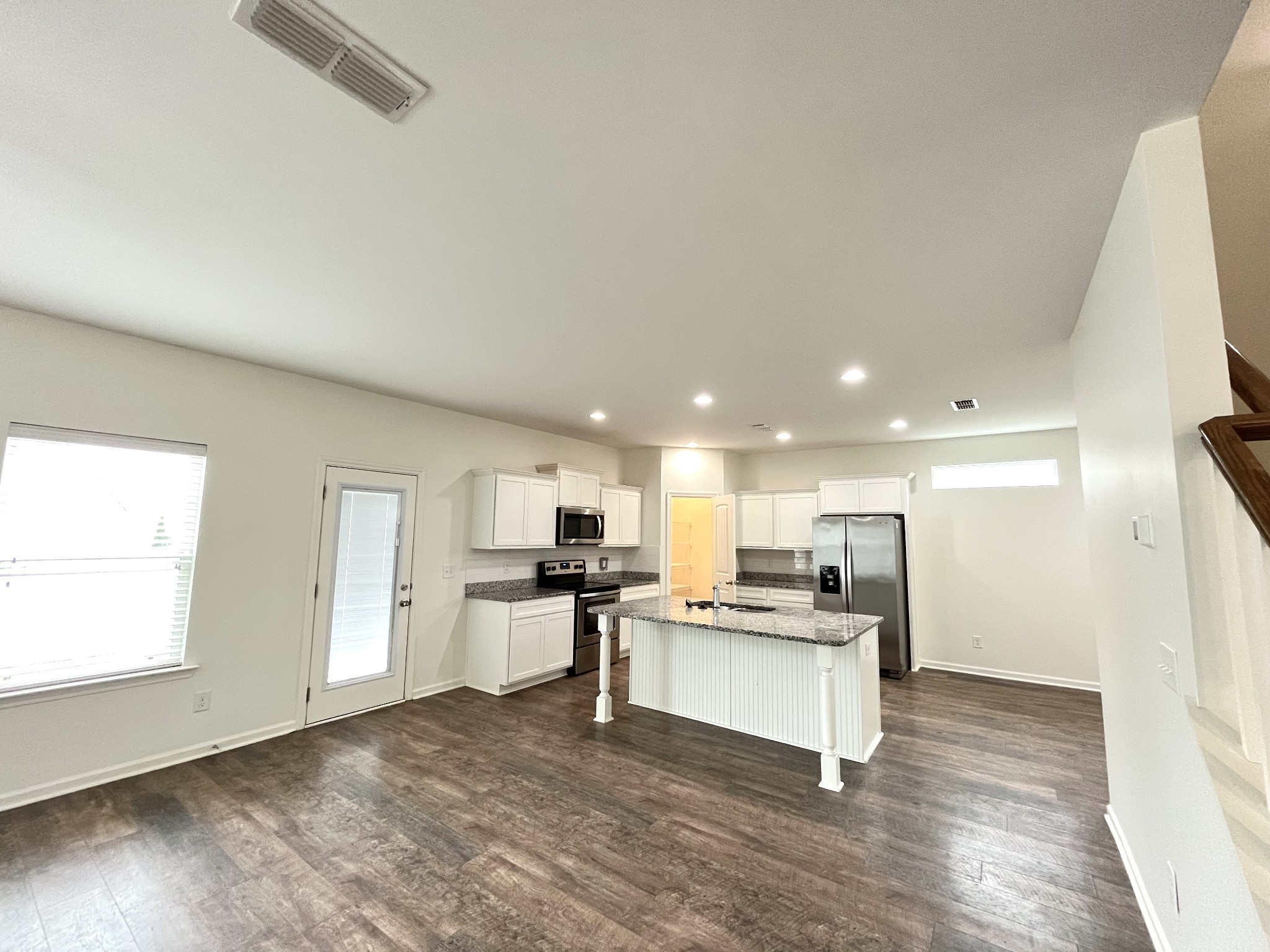 105 East Coker Way Spring Hill, TN 37174 - Photo 7 of 23 a view of kitchen with wooden floor
