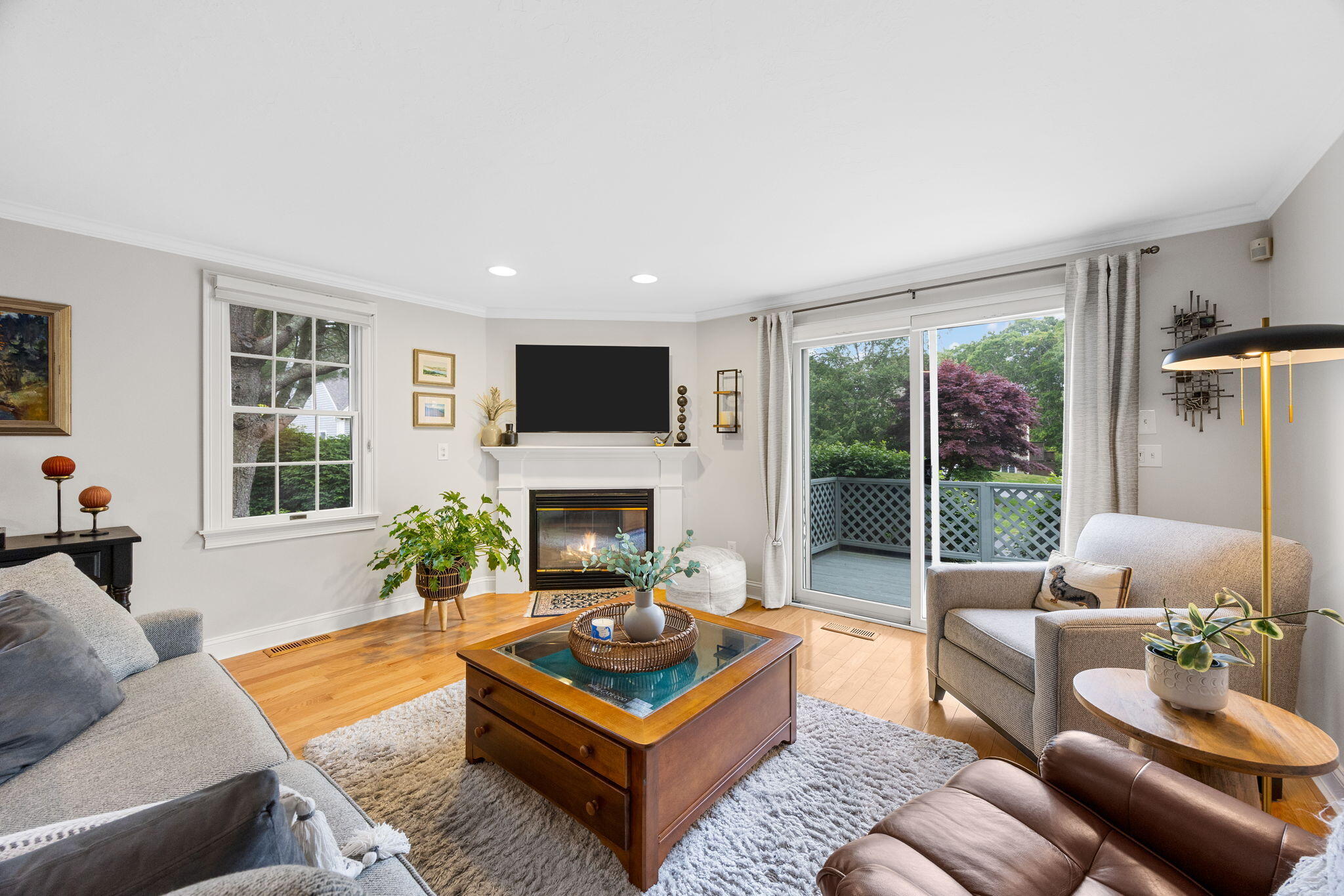 2 Darby Point Mashpee, MA 02649 - Photo 17 of 47 a living room with furniture fireplace and a large window