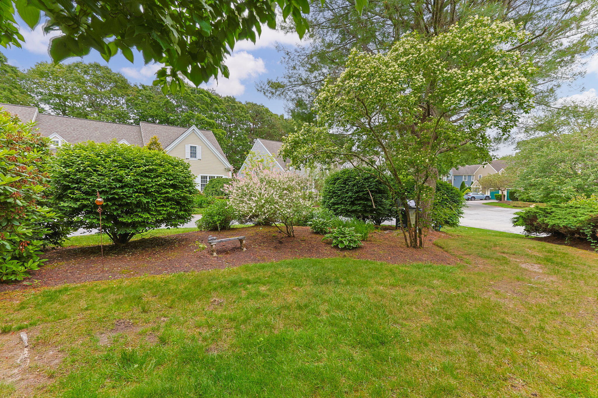 2 Darby Point Mashpee, MA 02649 - Photo 40 of 47 a backyard of a house with yard and trampoline