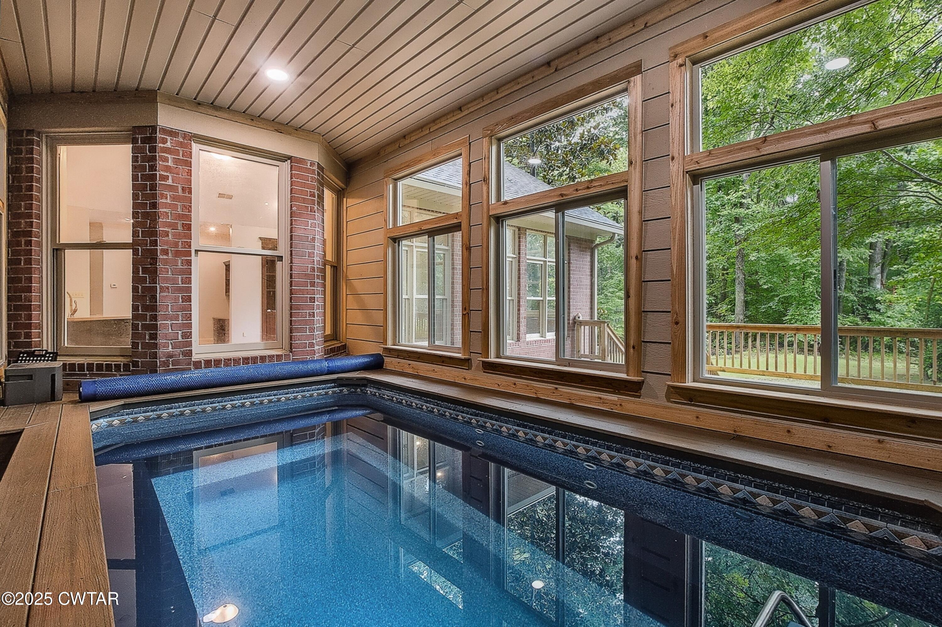 26 Bridlepath Drive Jackson, TN 38305 - Photo 19 of 53 a kitchen with large windows