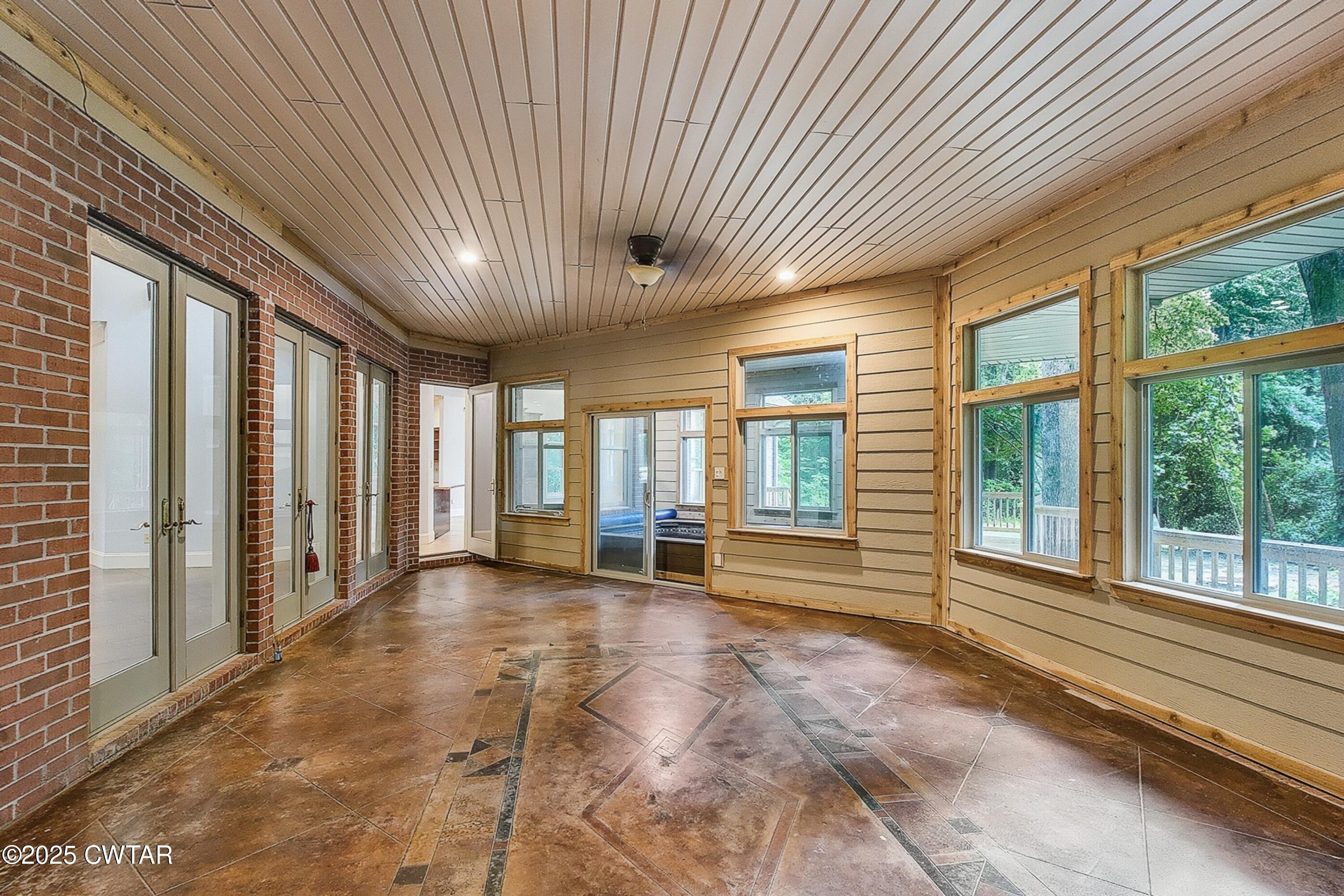 26 Bridlepath Drive Jackson, TN 38305 - Photo 23 of 53 a view of an empty room with wooden floor and a window