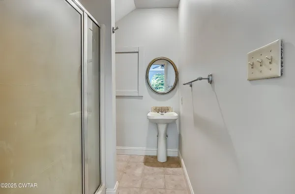 an empty room with a bathroom