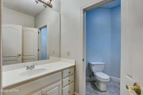 a view of bathroom with toilet