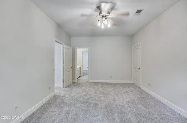 a bathroom with a bathtub and a sink