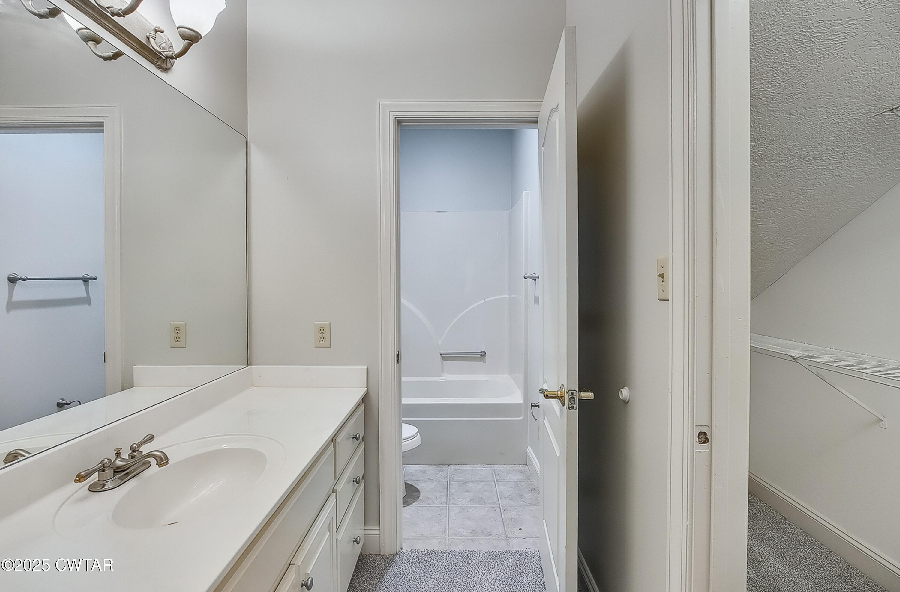26 Bridlepath Drive Jackson, TN 38305 - Photo 48 of 53 a bathroom with a bathtub and a sink