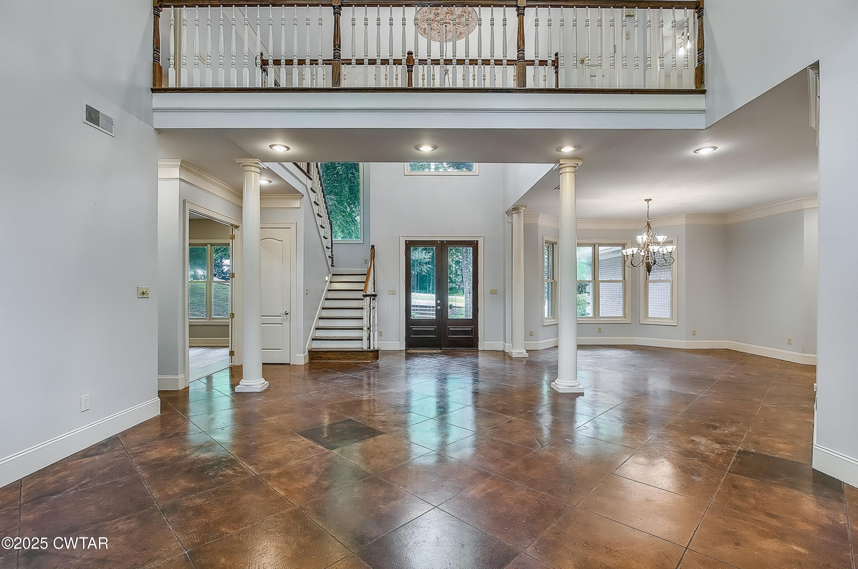 26 Bridlepath Drive Jackson, TN 38305 - Photo 7 of 53 a view of a hallway with wooden floor