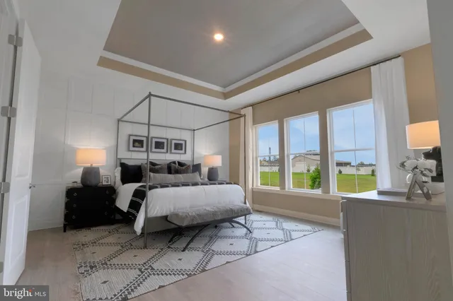 a bed room with a bed and a couch