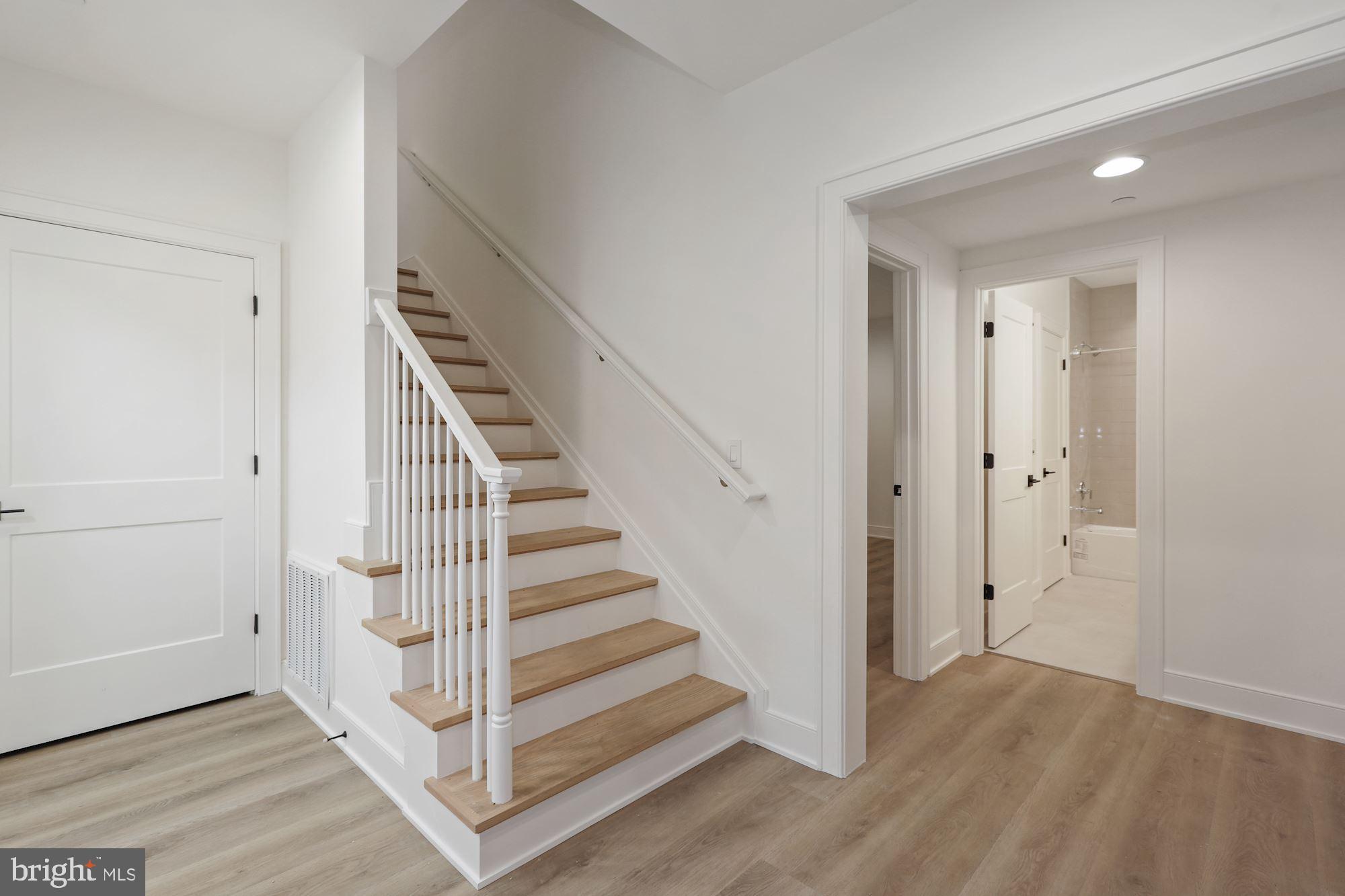 5703 Ridgefield Road Bethesda, MD 20816 - Photo 33 of 38 Lower Level Stair Hall