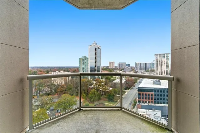 a view of a balcony with city view