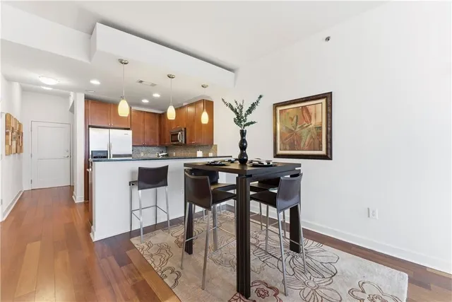 a view of a dining room with furniture