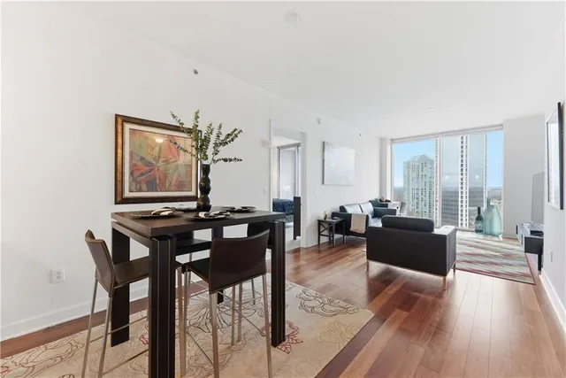 a view of a livingroom with furniture and window