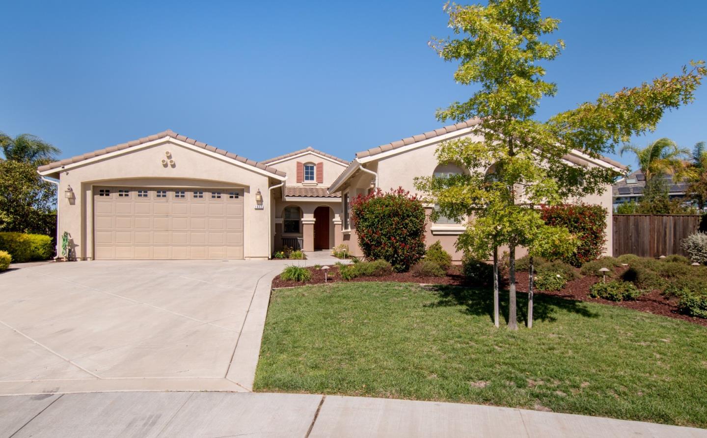 1655 Martinez Way Morgan Hill, CA 95037 - Photo 1 of 40 a front view of a house with a garden