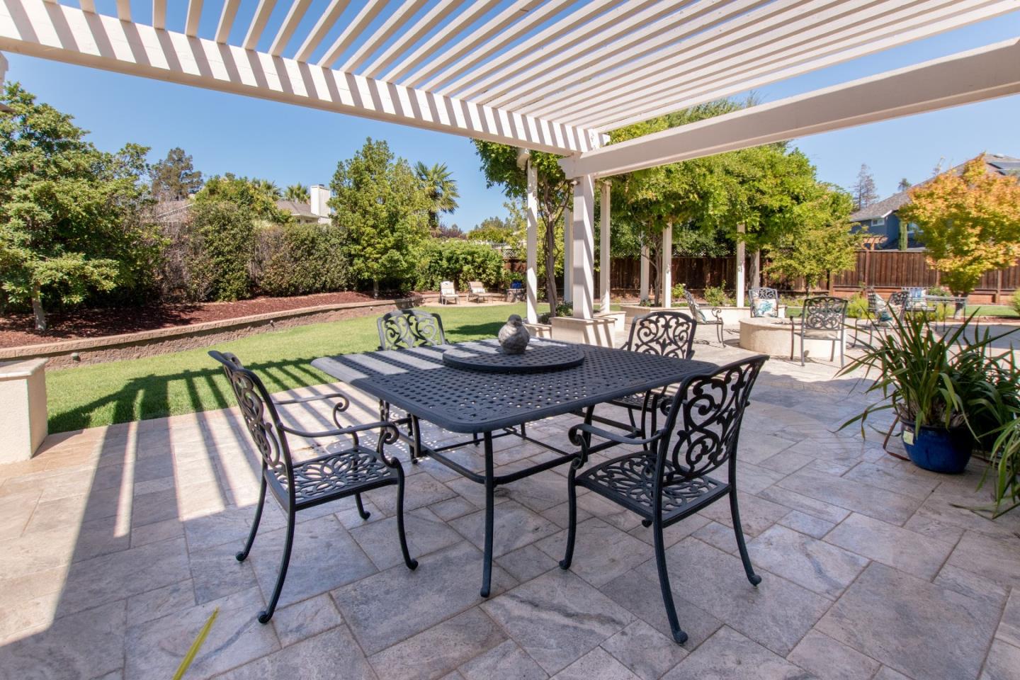1655 Martinez Way Morgan Hill, CA 95037 - Photo 15 of 40 a view of an outdoor dining space with a table and chairs
