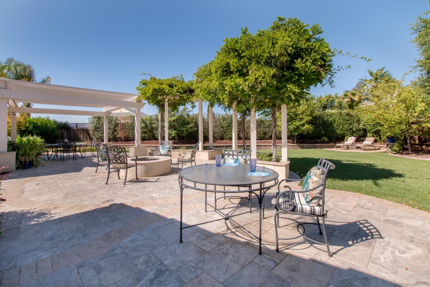 1655 Martinez Way Morgan Hill, CA 95037 - Photo 18 of 40 a view of a patio with a table and chairs