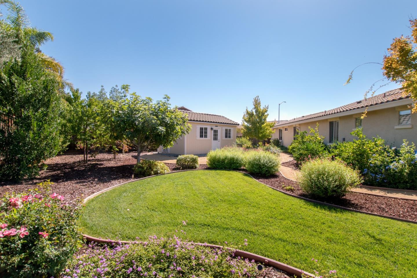 1655 Martinez Way Morgan Hill, CA 95037 - Photo 23 of 40 a front view of a house with garden