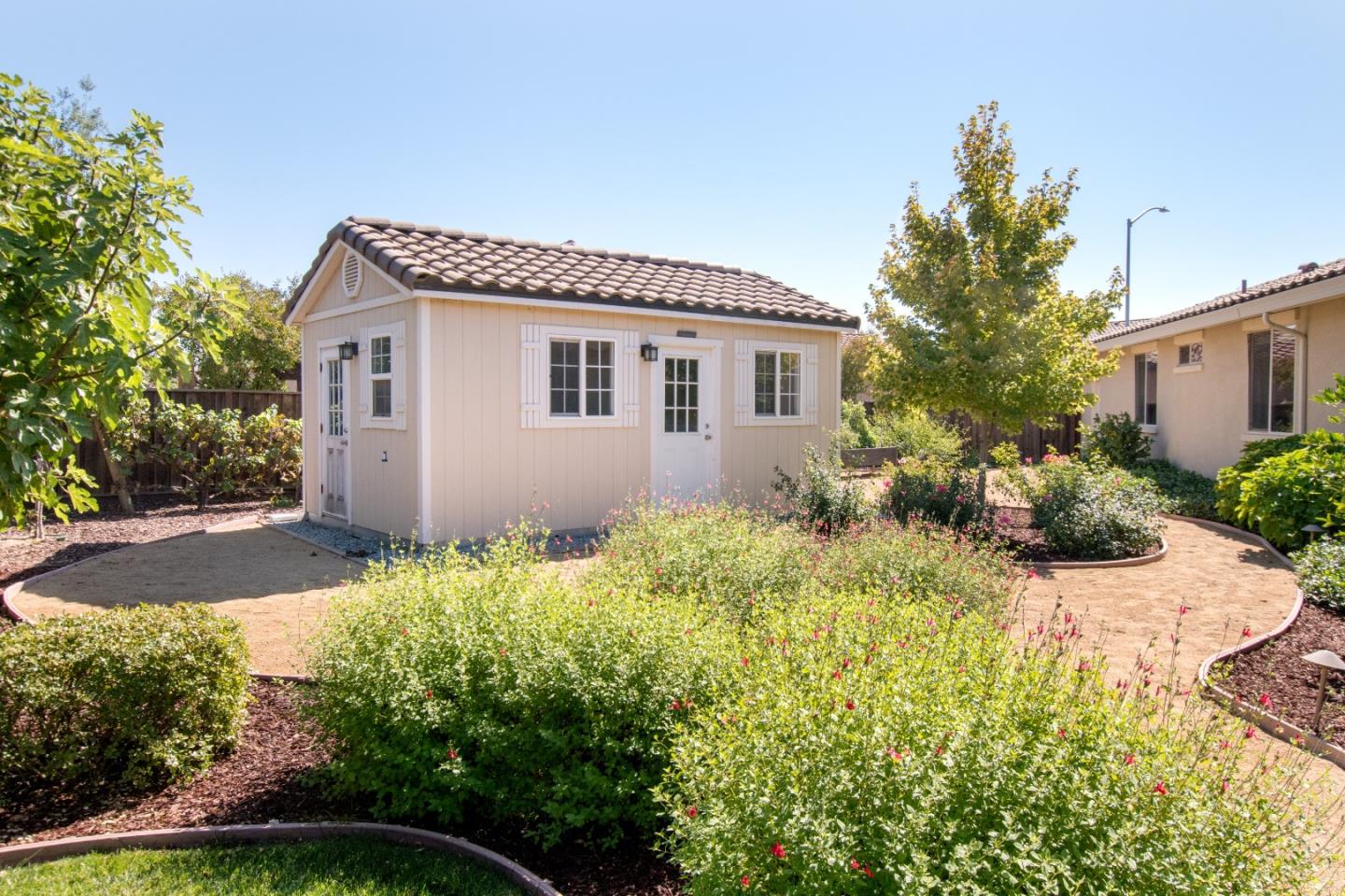 1655 Martinez Way Morgan Hill, CA 95037 - Photo 24 of 40 a house with trees in front of it