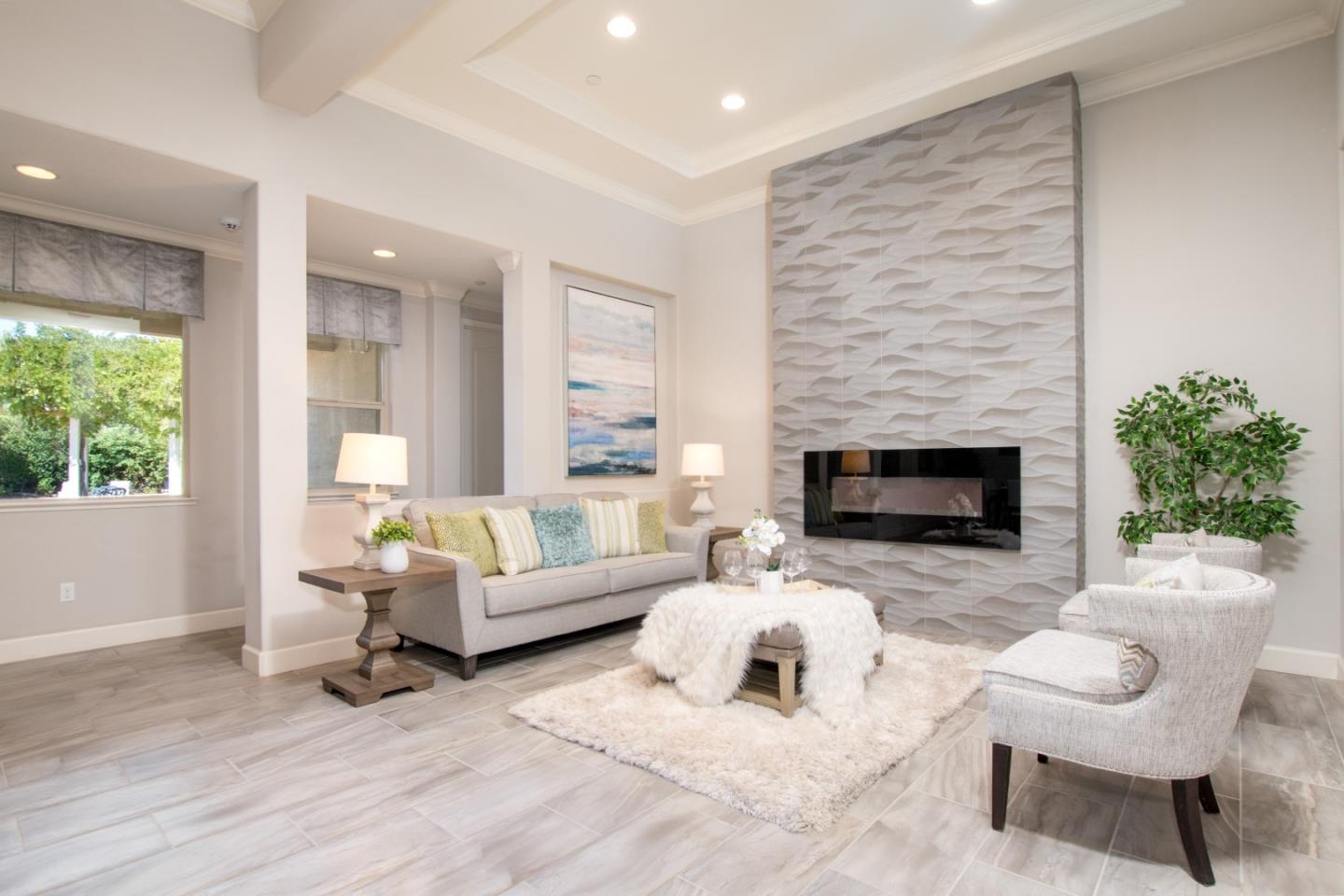 1655 Martinez Way Morgan Hill, CA 95037 - Photo 3 of 40 a living room with furniture and a fireplace