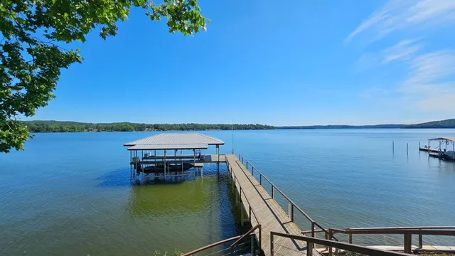 a view of a lake from a balcony