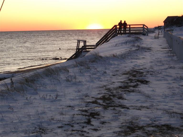 17 Beach Hills Road Dennis, MA 02639 - Photo 2 of 16 a view of ocean with a building