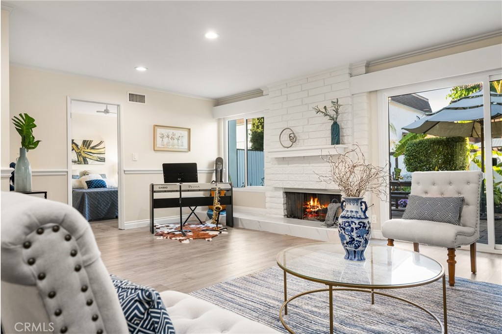 96 Seton Road Irvine, CA 92612 - Photo 13 of 51 a living room with furniture and a fireplace