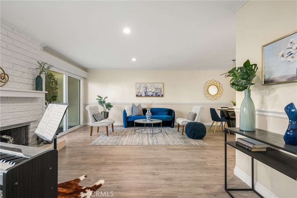 96 Seton Road Irvine, CA 92612 - Photo 15 of 51 a living room with furniture and a flat screen tv