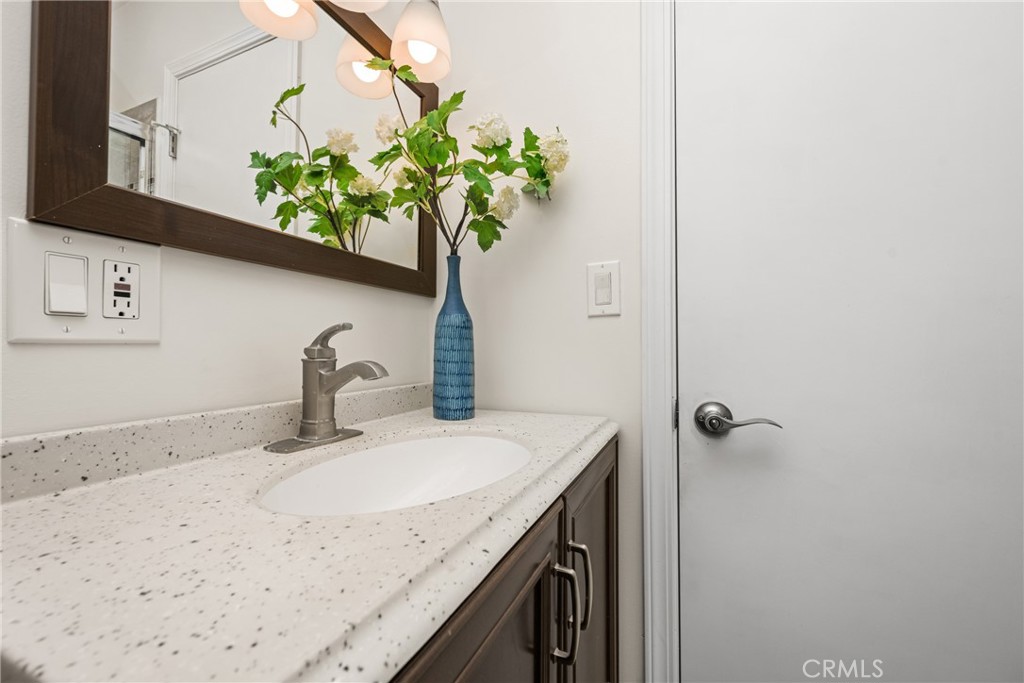 96 Seton Road Irvine, CA 92612 - Photo 30 of 51 a bathroom with a sink a vanity and a mirror