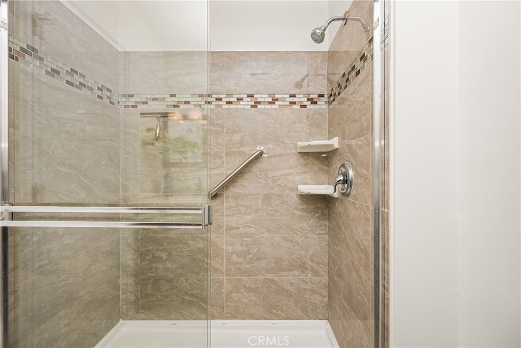96 Seton Road Irvine, CA 92612 - Photo 31 of 51 a bathroom with a shower