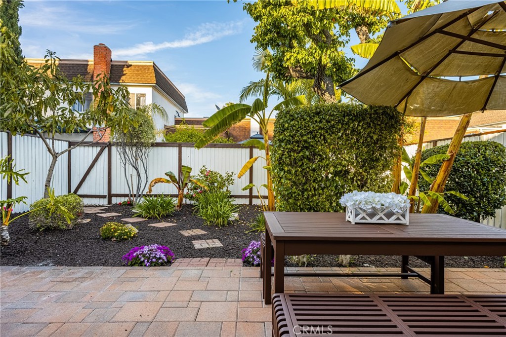 96 Seton Road Irvine, CA 92612 - Photo 33 of 51 a view of a patio with table and chairs potted plants