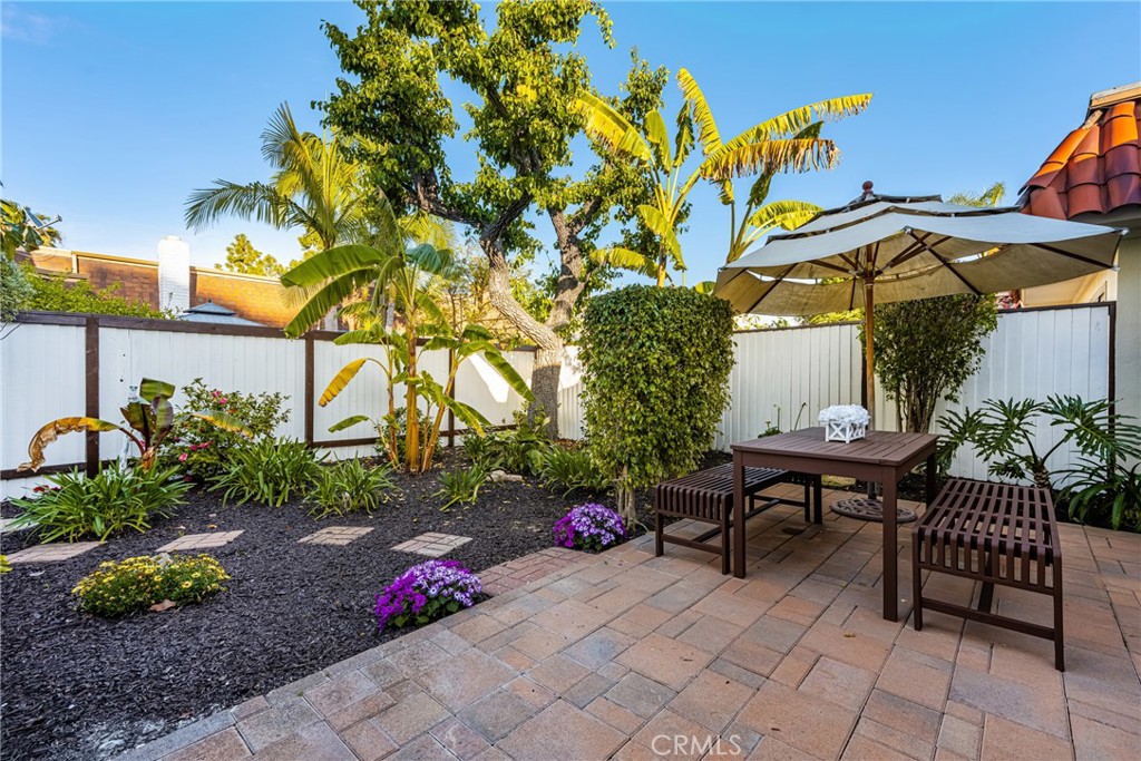 96 Seton Road Irvine, CA 92612 - Photo 35 of 51 a view of a chairs and table in a backyard