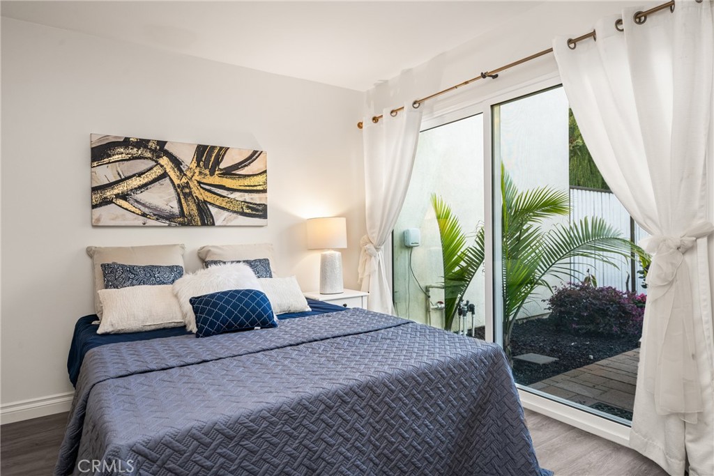 96 Seton Road Irvine, CA 92612 - Photo 38 of 51 a bedroom with a bed and a painting on the wall