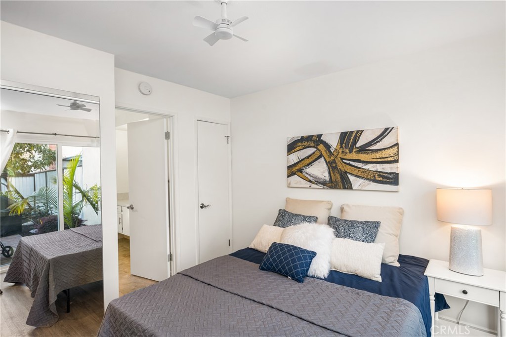 96 Seton Road Irvine, CA 92612 - Photo 40 of 51 a bedroom with a bed and a painting on the wall