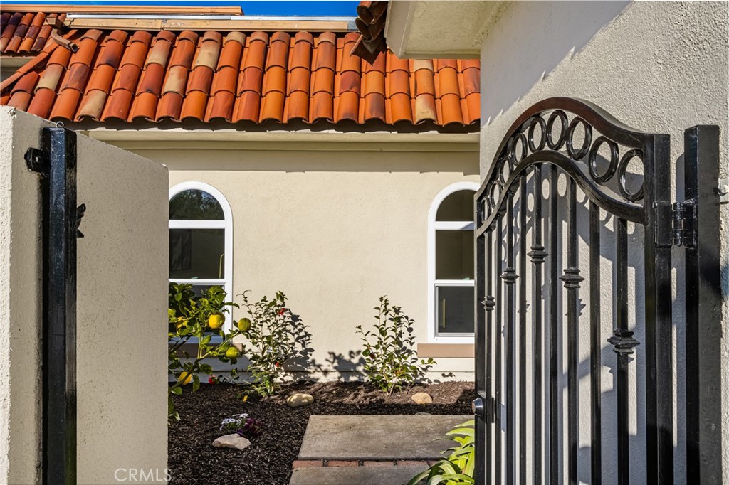 96 Seton Road Irvine, CA 92612 - Photo 4 of 51 a front view of a house with plants