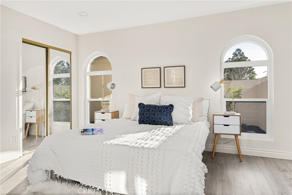 96 Seton Road Irvine, CA 92612 - Photo 44 of 51 a bedroom with a large bed and windows