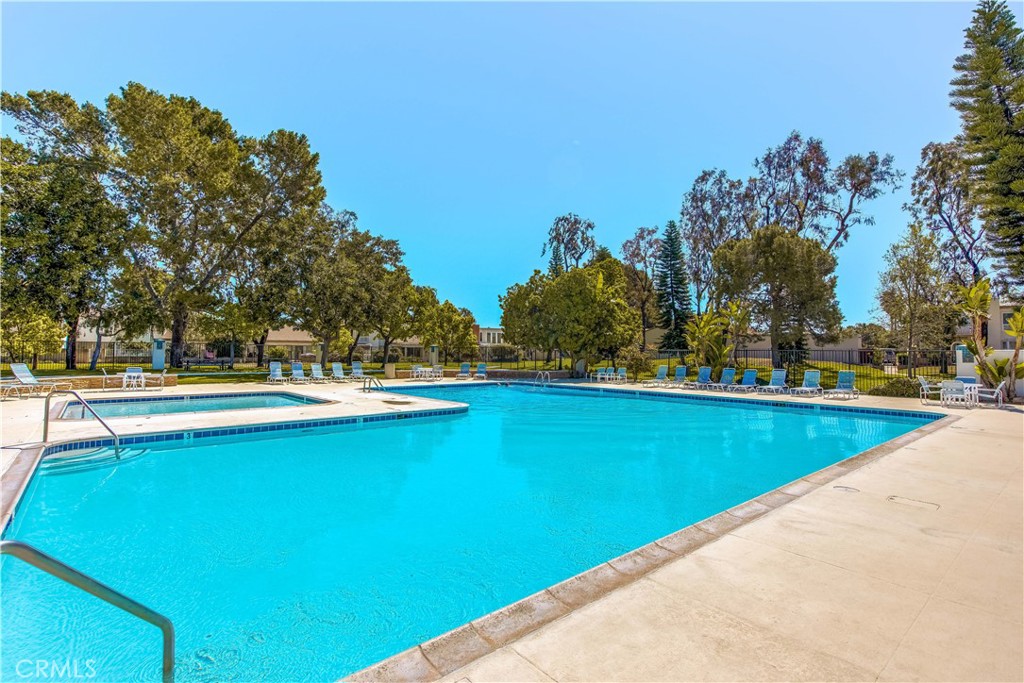 96 Seton Road Irvine, CA 92612 - Photo 50 of 51 a view of a swimming pool with an outdoor space and seating area