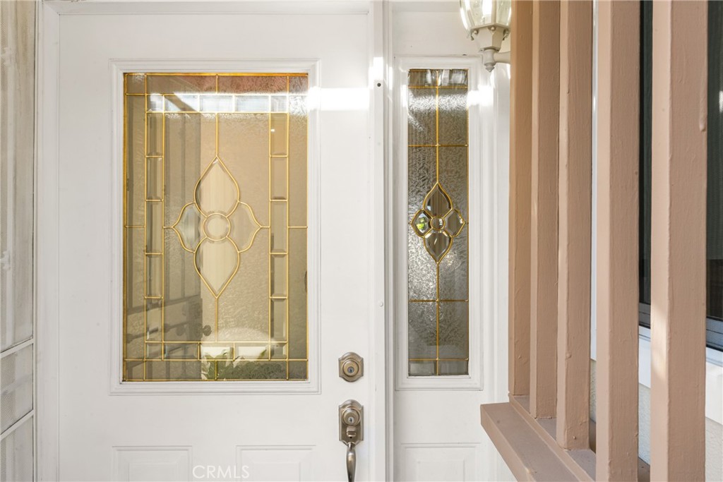 96 Seton Road Irvine, CA 92612 - Photo 7 of 51 a bathroom with a glass shower door and a mirror