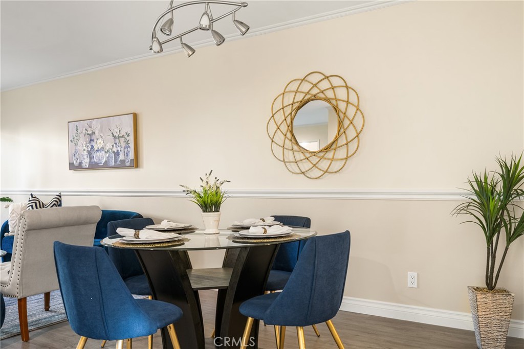 96 Seton Road Irvine, CA 92612 - Photo 10 of 51 a dining room with furniture and wooden floor