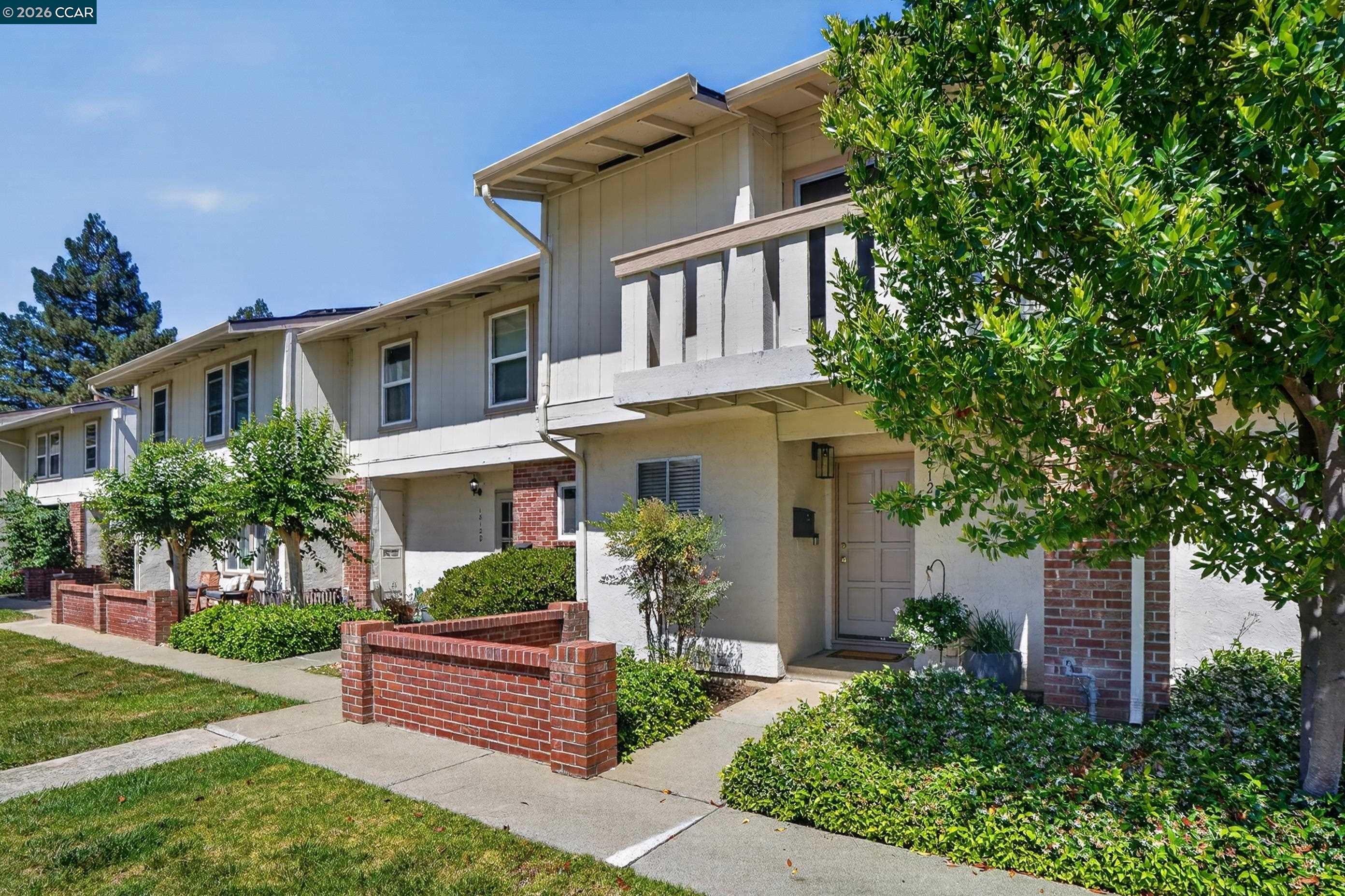 1812 Wildbrook Court, Unit C Concord, CA 94521 - Photo 35 of 35 front view of a house with a yard