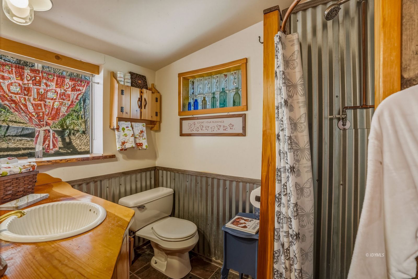 24945 Marion Ridge Drive Idyllwild, CA 92549 - Photo 21 of 53 a bathroom with a sink toilet and shower
