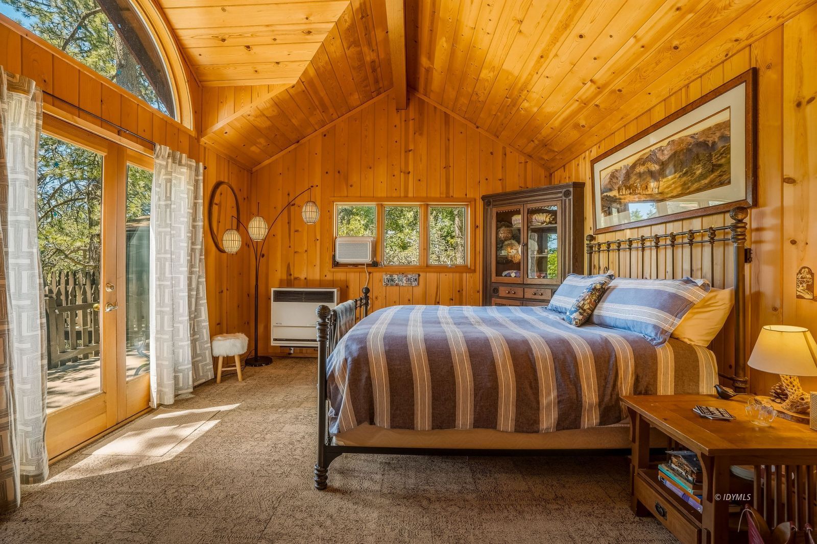 24945 Marion Ridge Drive Idyllwild, CA 92549 - Photo 32 of 53 a bed sitting in front of a bedroom