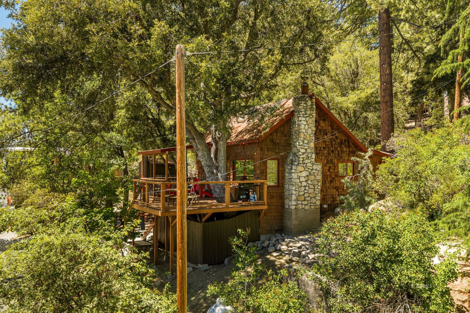 24945 Marion Ridge Drive Idyllwild, CA 92549 - Photo 47 of 53 a backyard of a house with lots of green space