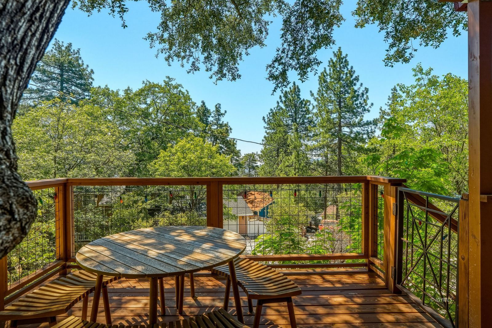 24945 Marion Ridge Drive Idyllwild, CA 92549 - Photo 5 of 53 a view of a chairs and table in the balcony