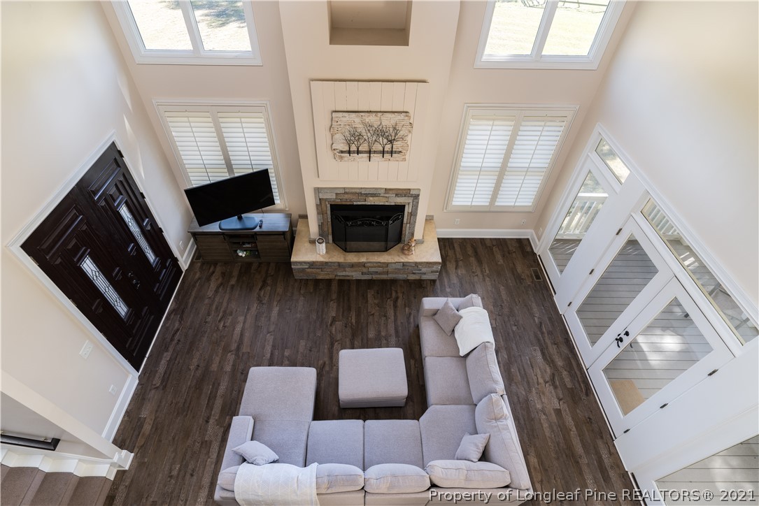 Undisclosed Address Aberdeen, NC 28315 - Photo 13 of 33 a living room with furniture and a fireplace