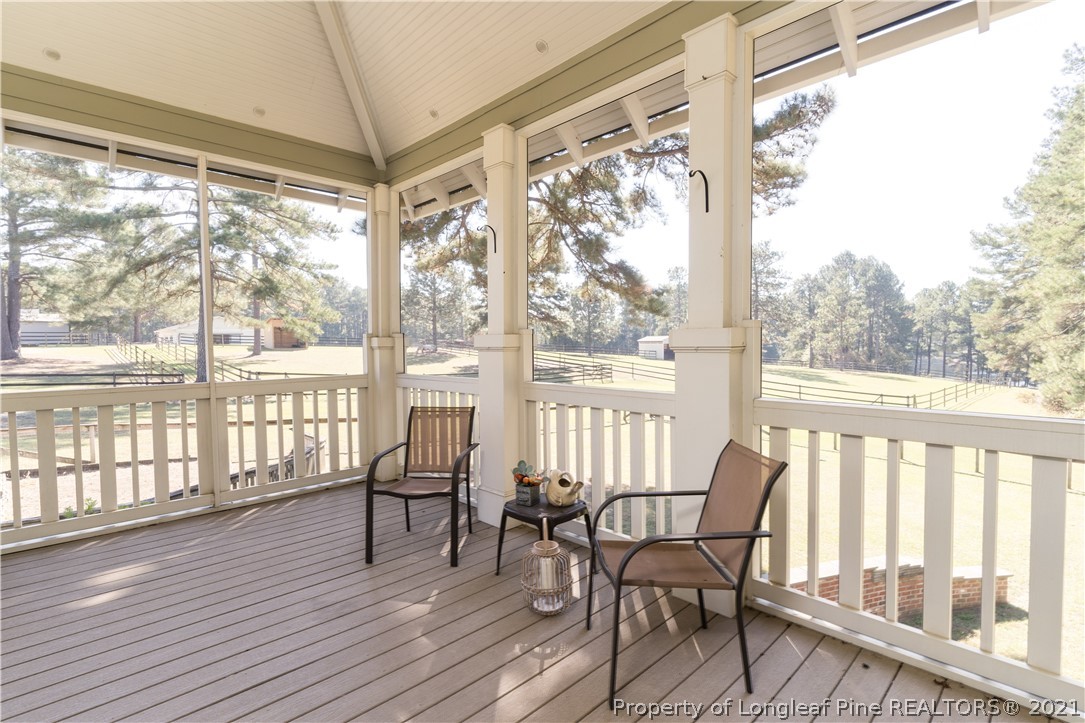 Undisclosed Address Aberdeen, NC 28315 - Photo 18 of 33 a view of a room with wooden floor and furniture