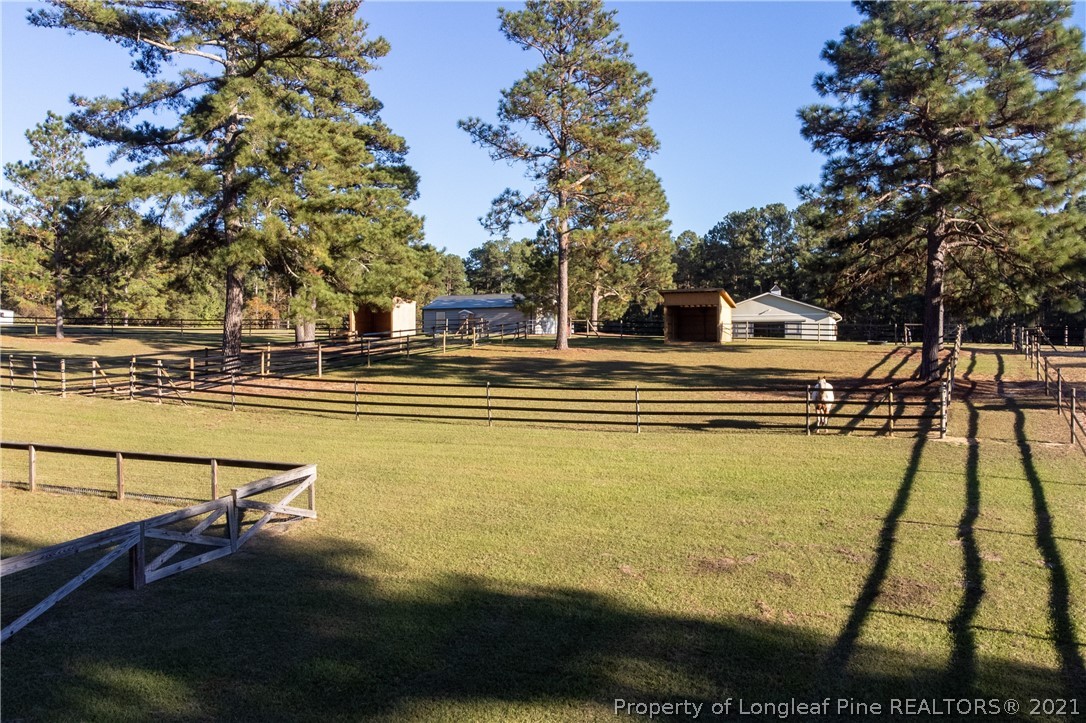 Undisclosed Address Aberdeen, NC 28315 - Photo 20 of 33 a view of swimming pool with seating area