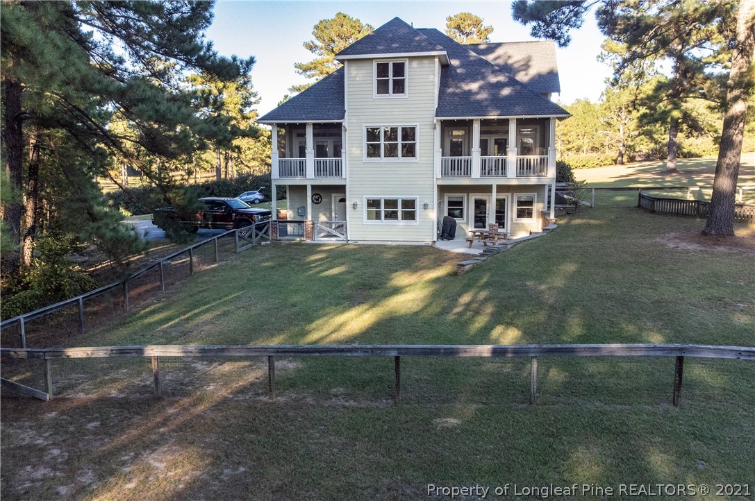 Undisclosed Address Aberdeen, NC 28315 - Photo 2 of 33 a view of a yard in front of house